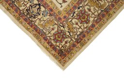Backside of handmade 1920s Tabriz rug showing knot structure and weave density