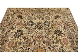 Surface texture of 1900s Tabriz rug with natural Wool and intricate pattern