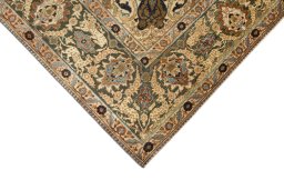 Backside of handmade 1900s Tabriz rug showing knot structure and weave density