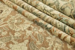 Corner detail of 1900s Tabriz rug showing border pattern and Wool pile