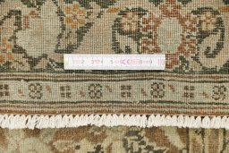 Close-up detail of 1900s Tabriz rug from Iran / Persia showing Wool weave