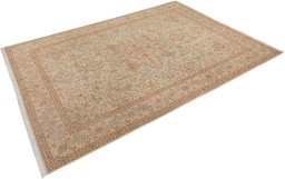 Corner detail of New Tabriz rug showing border pattern and Wool pile