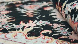 Close-up detail of 1980s Tabriz rug from Iran / Persia showing Wool weave