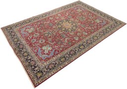 Close-up detail of 1990s Tabriz rug from Iran / Persia showing Wool weave