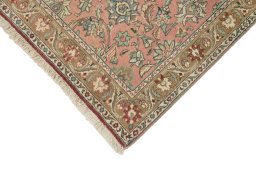 Backside of handmade 1950s Tabriz rug showing knot structure and weave density