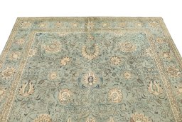 Surface texture of 1940s Tabriz rug with natural Wool and intricate pattern