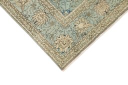 Backside of handmade 1940s Tabriz rug showing knot structure and weave density