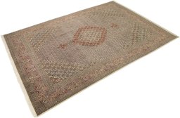 Close-up detail of New Tabriz rug from Iran / Persia showing Wool weave