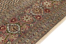 Central medallion detail of New Tabriz rug from Iran / Persia