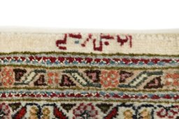 Close-up detail of New Tabriz rug from Iran / Persia showing Wool weave
