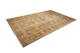 Corner detail of 1950s Tabriz rug showing border pattern and Wool pile