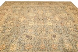 Backside of handmade 1950s Tabriz rug showing knot structure and weave density