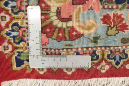 Corner detail of 1930s Tabriz rug showing border pattern and Wool pile