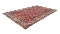 Corner detail of 1950s Tabriz rug showing border pattern and Wool pile