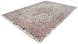 Corner detail of 1990s Tabriz rug showing border pattern and Wool pile
