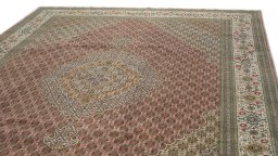 Surface texture of 1990s Tabriz rug with natural Wool and intricate pattern