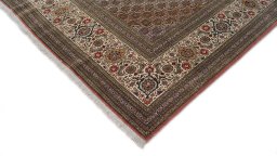 Backside of handmade 1990s Tabriz rug showing knot structure and weave density