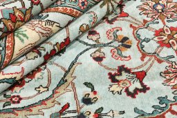 Corner detail of 1940s Tabriz rug showing border pattern and Wool pile