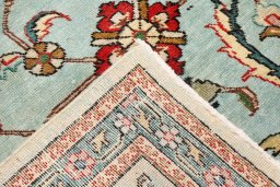 Close-up detail of 1940s Tabriz rug from Iran / Persia showing Wool weave
