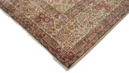 Backside of handmade 1940s Tabriz rug showing knot structure and weave density