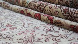 Close-up detail of 1940s Tabriz rug from Iran / Persia showing Wool weave