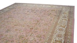 Surface texture of 1960s Tabriz rug with natural Wool and intricate pattern
