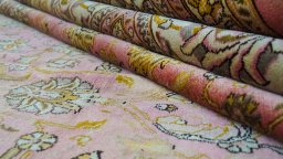 Close-up detail of 1960s Tabriz rug from Iran / Persia showing Wool weave