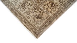 Backside of handmade 1960s Tabriz rug showing knot structure and weave density