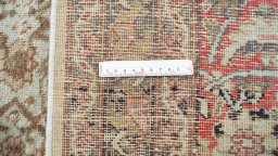 Full view of 1900s Tabriz rug from Iran / Persia, 378 × 282 cm in Brown tones