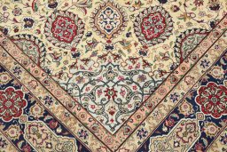 Corner detail of 1960s Tabriz rug showing border pattern and Wool pile