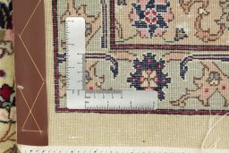 Surface texture of 1960s Tabriz rug with natural Wool and intricate pattern