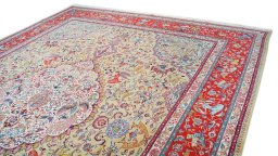 Surface texture of 1950s Tabriz rug with natural Wool and intricate pattern