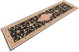 Corner detail of New Tabriz rug showing border pattern and Wool pile