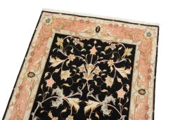 Surface texture of New Tabriz rug with natural Wool and intricate pattern