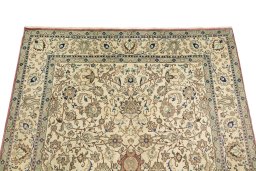 Surface texture of New Tabriz rug with natural Wool and intricate pattern