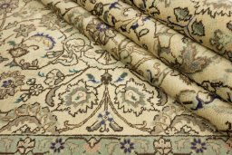 Close-up detail of New Tabriz rug from Iran / Persia showing Wool weave