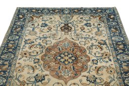 Surface texture of 1940s Tabriz rug with natural Wool and intricate pattern