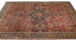 Backside of handmade 1930s Tabriz rug showing knot structure and weave density