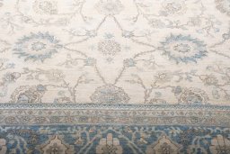 Backside of handmade New Tabriz rug showing knot structure and weave density