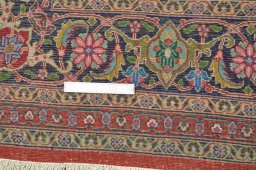 Corner detail of New Tabriz rug showing border pattern and Cork pile