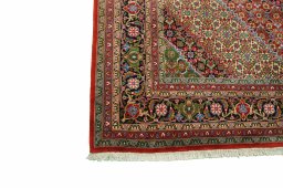 Central medallion detail of New Tabriz rug from Iran / Persia