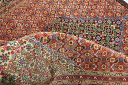 Close-up detail of New Tabriz rug from Iran / Persia showing Cork weave