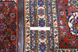 Close-up detail of 2000s Tabriz rug from Iran / Persia showing Wool weave
