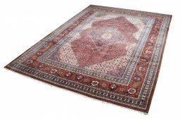 Close-up detail of 2000s Tabriz rug from Iran / Persia showing Wool weave