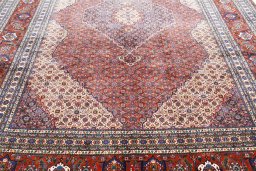 Close-up detail of 2000s Tabriz rug from Iran / Persia showing Wool weave