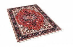 Corner detail of New Tabriz rug showing border pattern and Cork pile
