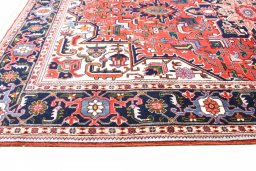 Backside of handmade New Tabriz rug showing knot structure and weave density