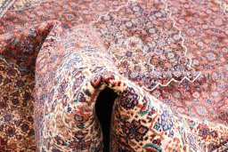 Surface texture of 1970s Tabriz rug with natural Wool and intricate pattern