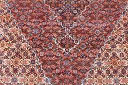 Close-up detail of 1970s Tabriz rug from Iran / Persia showing Wool weave