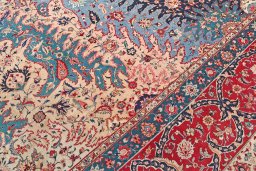 Backside of handmade 1930s Tabriz rug showing knot structure and weave density